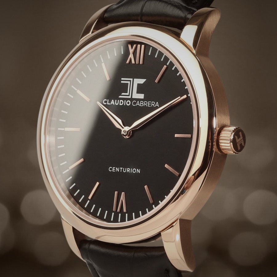Centurion model with roman numerals against golden bokeh