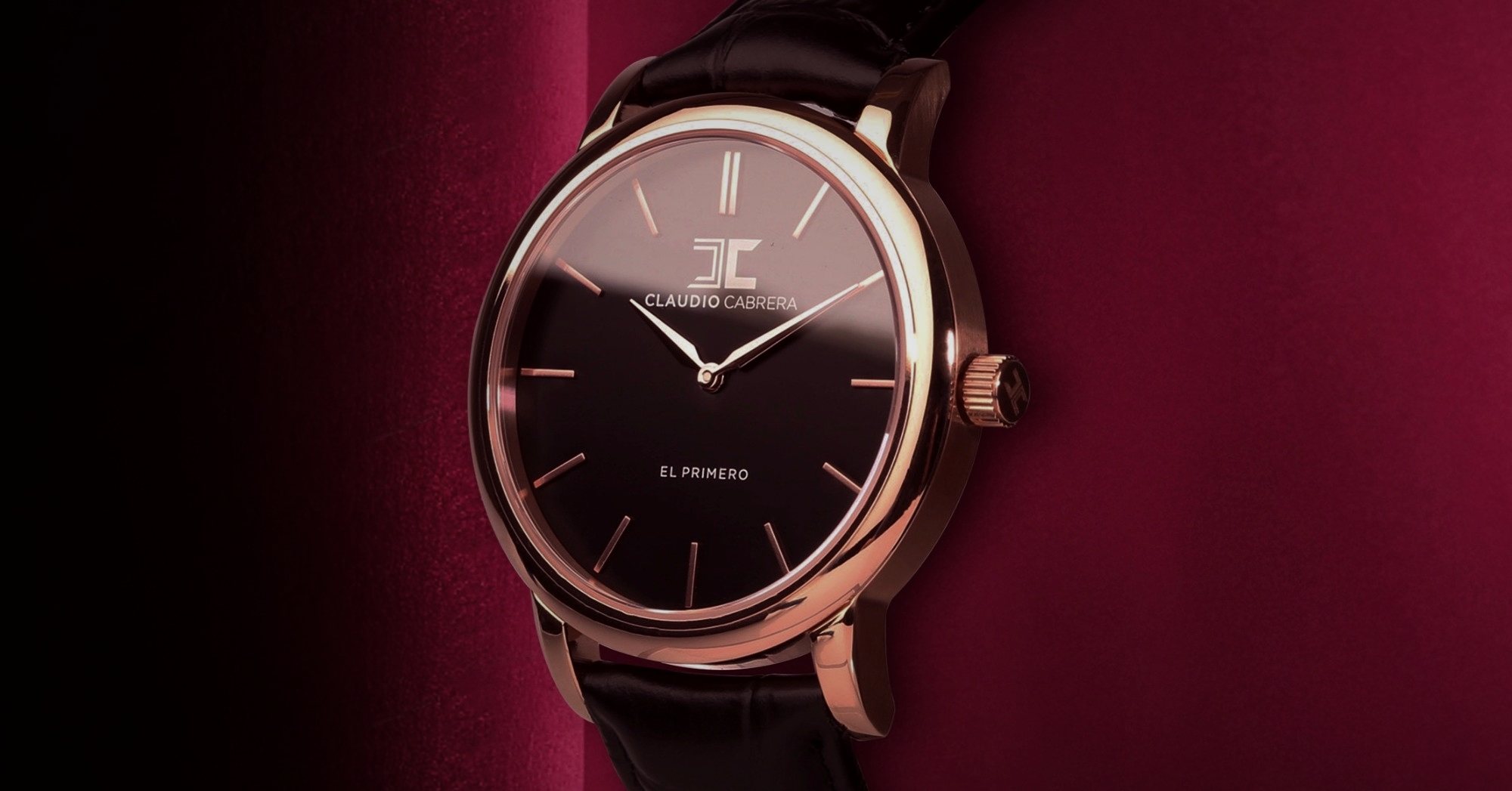 Claudio Cabrera El Primero watch in rose gold with a black dial against deep red velvet